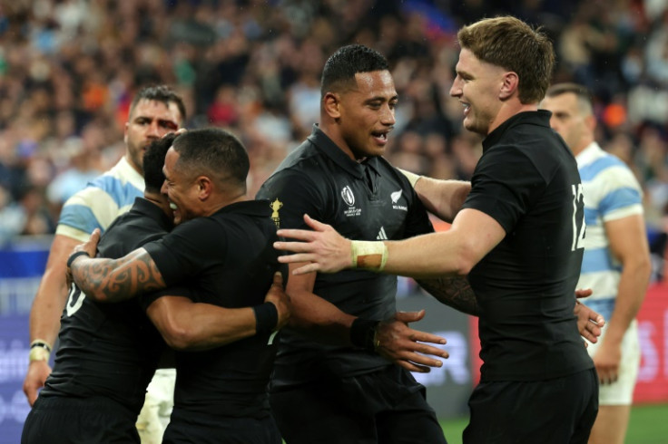Shannon Frizell (C) celebrates with his teammates after scoring New Zealand's third try in the World Cup semi-final against Argentina
