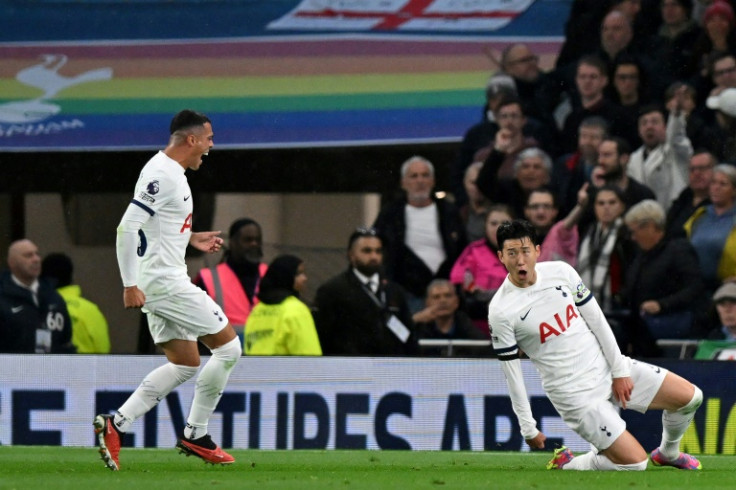 Tottenham's Son Heung-min (R) celebrates after scoring against Fulham