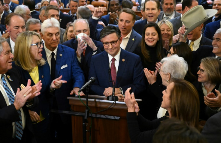 Mike Johnson (center) is applauded after being nominated Republican speaker of the US House of Representatives on October 24, 2023