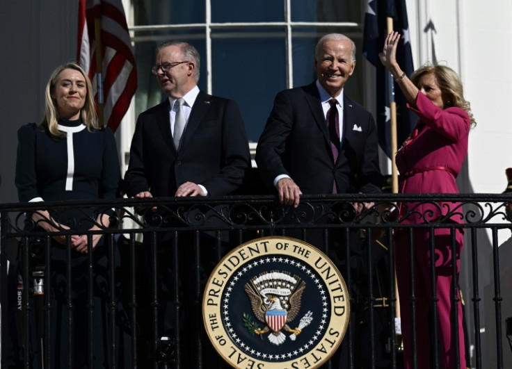 US President Joe Biden and First Lady Jill Biden wave from a White House balcony with Australia's Prime Minister Anthony Albanese and Jodie Haydon