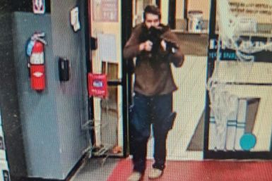 This handout image released on October 25, 2023 by the Androscoggin County Sheriff's Office via Facebook shows the armed suspect in a shooting in Lewiston, Maine