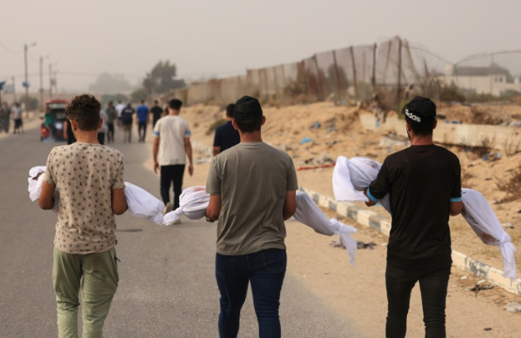 The heavy civilian death toll in Khan Yunis, including the al-Zanati family seen here, is driving families to return north.