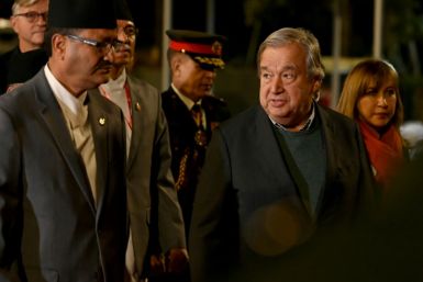United Nations Secretary General Antonio Guterres (R) walks with Nepal's Foreign Minister Narayan Prakash Saud