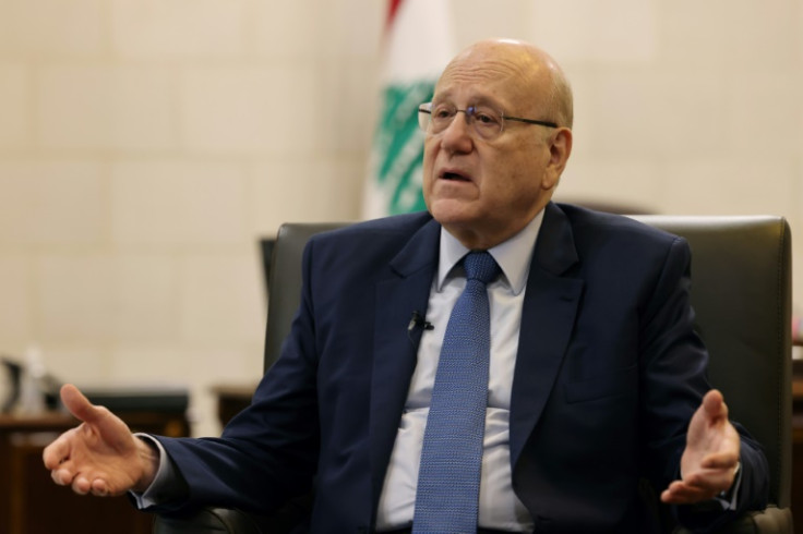 Lebanon's caretaker prime minister Najib Mikati speaks during an interview with AFP