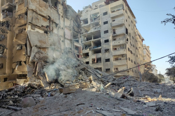 Destroyed buildings in the west of Gaza City as battles between Israel and Hamas rage into a fourth week