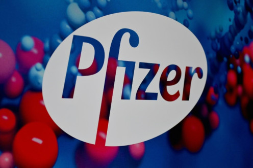 Pfizer reported a third-quarter loss due to a writedown in Covid-19 products