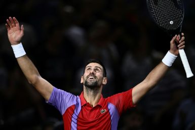 Novak Djokovic celebrates after beating Tomas Martin Etcheverry at the Paris Masters