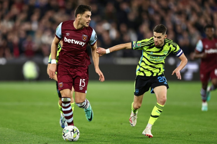 Arsenal midfielder Jorginho (R) in action during the League Cup loss at West Ham