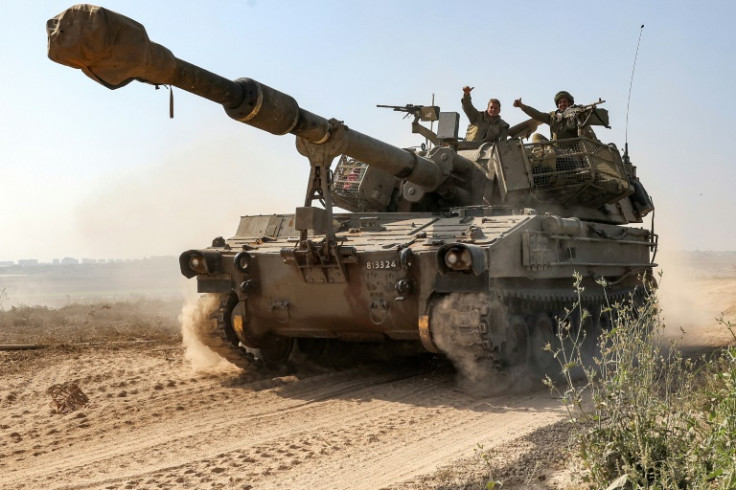 Israeli forces have been bombarding targets inside Gaza and ground troops are now said to have encircled Gaza City