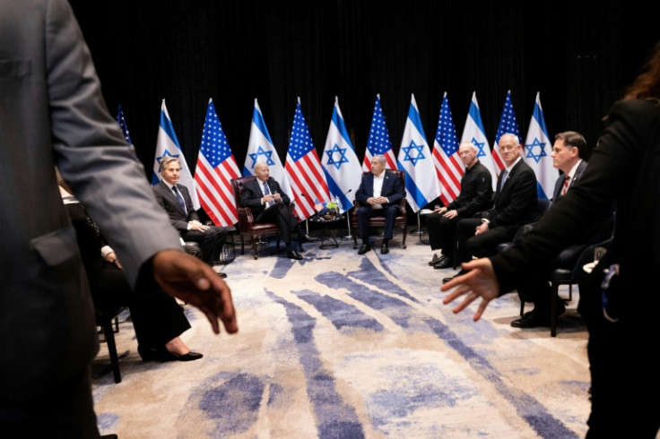 US Secretary of State Antony Blinken  and US President Joe Biden join Israel's Prime Minister Benjamin Netanyahu and other Israeli officials as they wait for the start of the Israeli war cabinet meeting in Tel Aviv on October 18, 2023