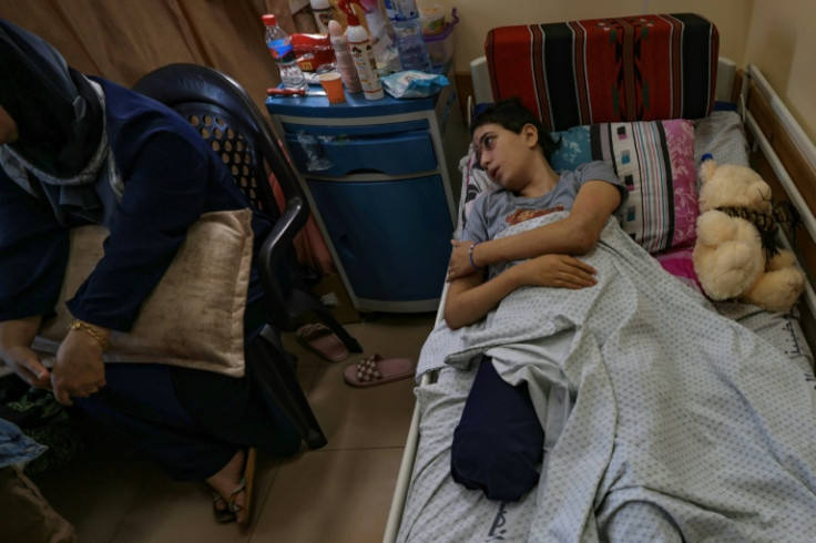 Lama al-Agha, 14, is another amputee at the Nasser hospital in Khan Yunis where her sister Sarah, 15, is treated in an adjacent bed