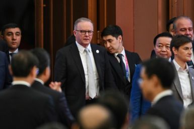 Australian PM Anthony Albanese (C) attended a trade expo in Shanghai on Sunday, and meets with Xi Jinping in Beijing on Monday