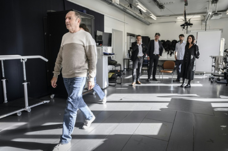 Marc, who has advanced Parkinson's disease, walks with help from electrodes implanted in his spine at Lausanne University Hospital in Switzerland
