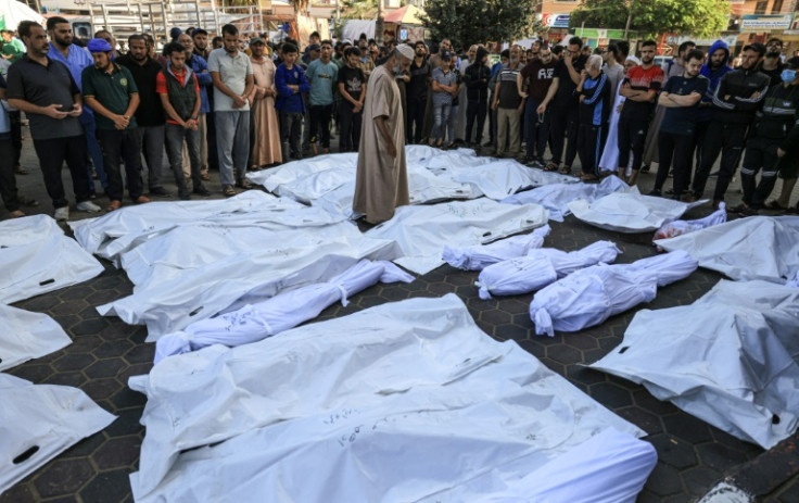 Bodies wrapped in shrouds at the Shuhada Al-Aqsa hospital in Deir Balah in the central Gaza Strip on November 6, 2023