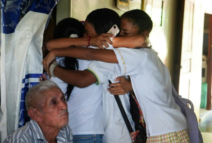 Relatives celebrate the release of Luis Manuel Diaz 12 days after he was kidnapped by a unit of the ELN guerrilla group