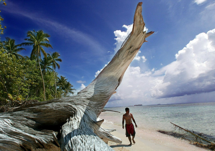Two of Tuvalu's nine coral islands have already largely disappeared under the waves, and climate scientists fear the entire archipelago will be uninhabitable within the next 80 years