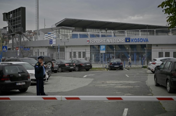 Police stand guard near the Fadil Vokrri stadium in Pristina ahead of Kosovo's rearranged Euro 2024 qualifier against Israel