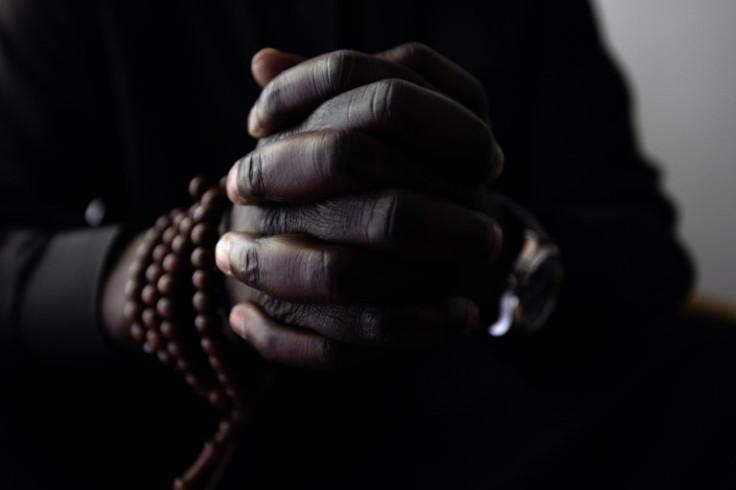 Sheikh Issa, an African faith healer in the Paris suburbs