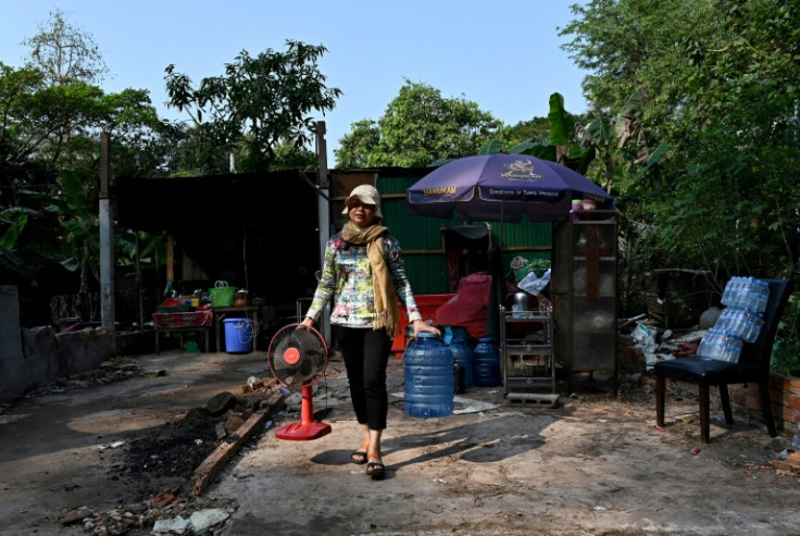 Cambodian authorities say they are acting to protect the ruins by moving squatters whose informal settlements are damaging the local environment