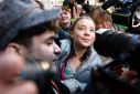 Swedish environmental activist Greta Thunberg was mobbed outside court