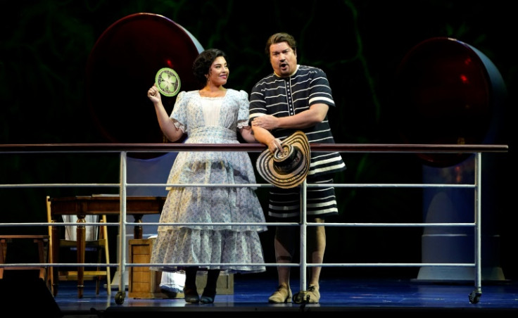 Gabriella Reyes, performing as journalist Rosalba, and tenor Mario Chang, performing as the captain's nephew Arcadio, take part in a dress rehearsal of "Florencia en el Amazonas"