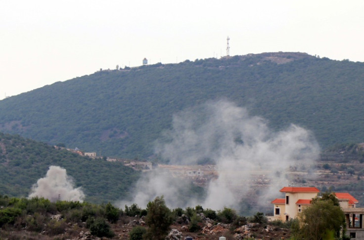 Smoke rises following Israeli artilley shelling on Beit Lif village, along Lebanon's border with Israel -- there have been deadly skirmishes mainly between Israel and Hezbollah militants