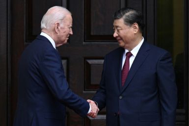 US President Joe Biden greets Chinese President Xi Jinping before their summit