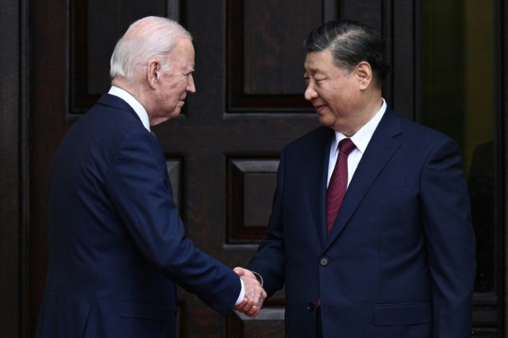 US President Joe Biden greets Chinese President Xi Jinping before their summit