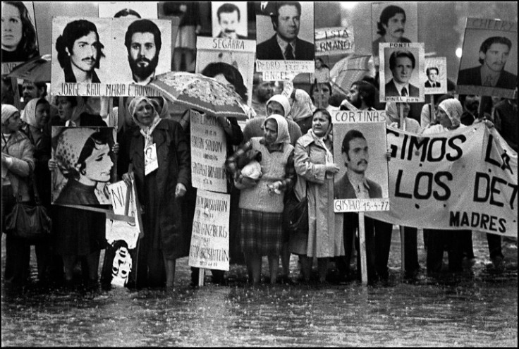 Mothers protest with photos of missing citizens in front of the government house in Buenos Aires in 1982, during Argentina's military dictatorship