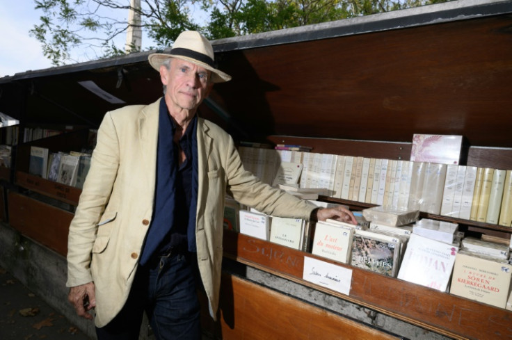 Bookseller Michel Bouetard says the move is like a tooth extraction