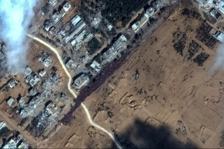 A satellite picture shows a crowd of people fleeing toward the southern part of the Gaza Strip