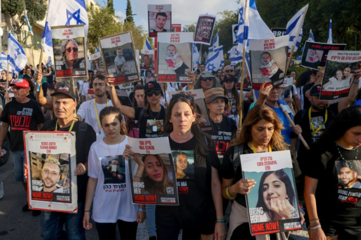 Relatives, friends and supporters of Israeli hostages demonstrate in the central city of Modiin