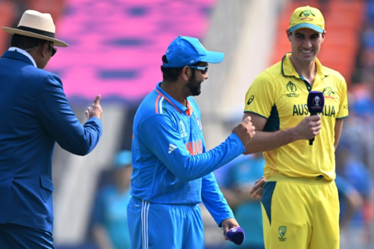 'Runs on the board': India captain Rohit Sharma (centre) with his Australia counterpart Pat Cummins at the toss