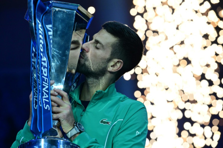 Novak Djokovic celebrates winning the ATP Finals for a record-breaking seventh time