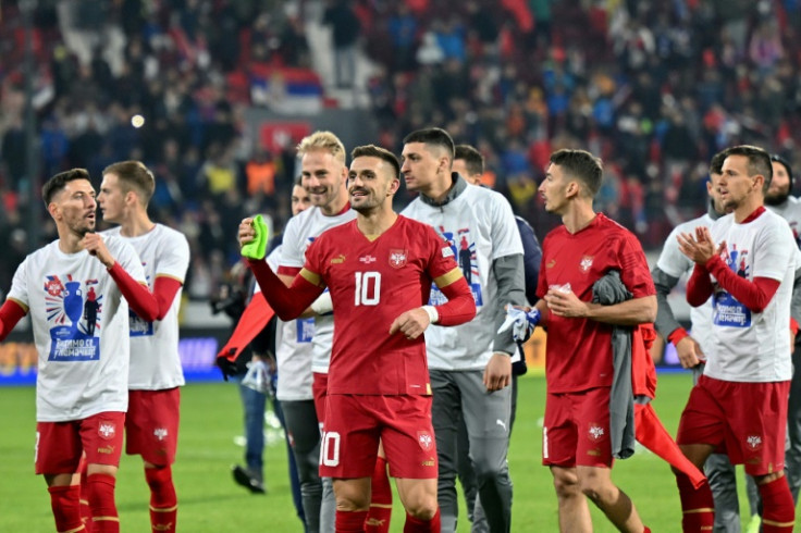 Serbia's players celebrate reaching the European Championship for the first time