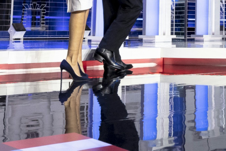 The footwear of Republican presidential candidate Nikki Haley and Ron DeSantis is seen during the third primary debate on November 8, 2023 in Miami