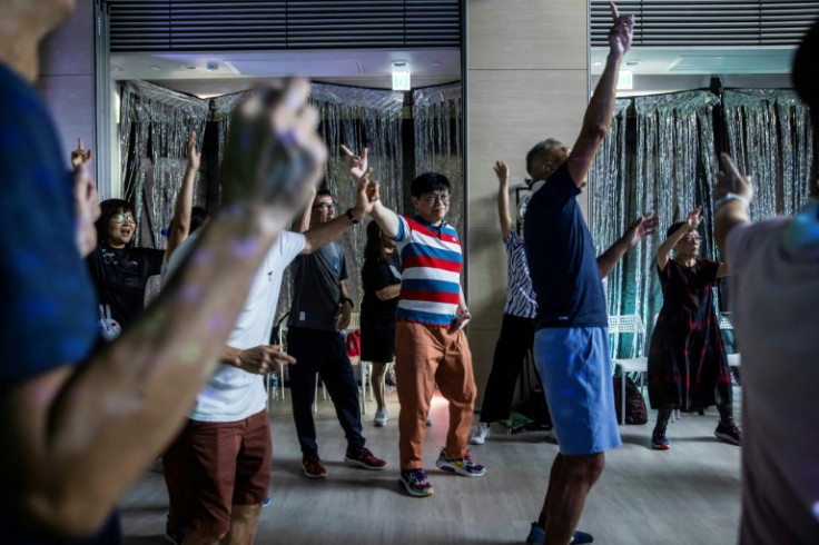 Weekly afternoon disco sessions for Hong Kong's elderly take place at a community centre complete with a spinning mirror ball