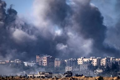 Somke rises over multiple targets in the Gaza Strip after an Israeli bombardment on Tuesday