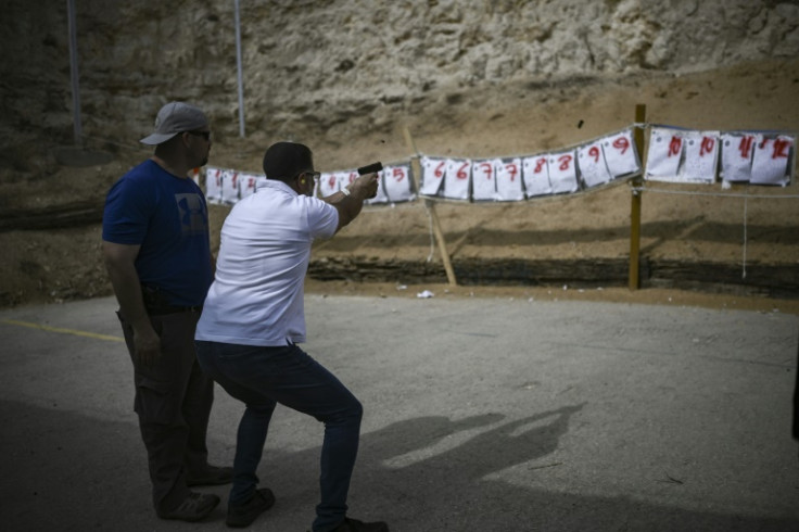 Israelis practice shooting at a range in the occupied West Bank.
