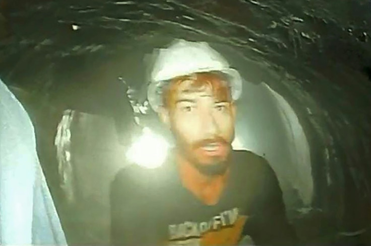 Rescue teams released images taken on an endoscopic camera of workers trapped inside the under-construction tunnel