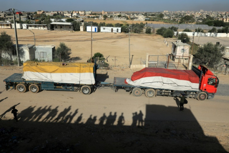 Trucks carrying humanitarian aid entered the Gaza Strip via the Rafah crossing with Egypt after the truce began