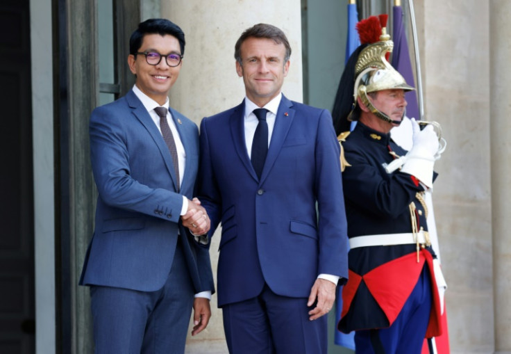 Rajoelina, seen here with French President Emmanuel Macron in Paris earlier this year, has received flak for holding French nationality