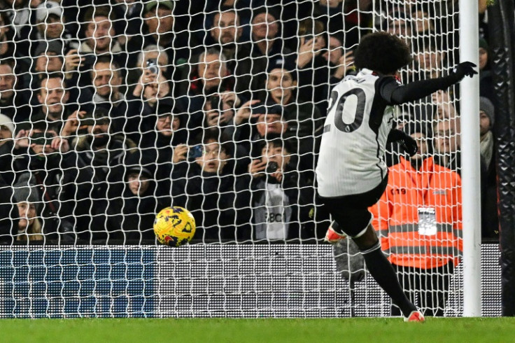 Fulham's Willian scores his team's winner against Wolves from the penalty spot