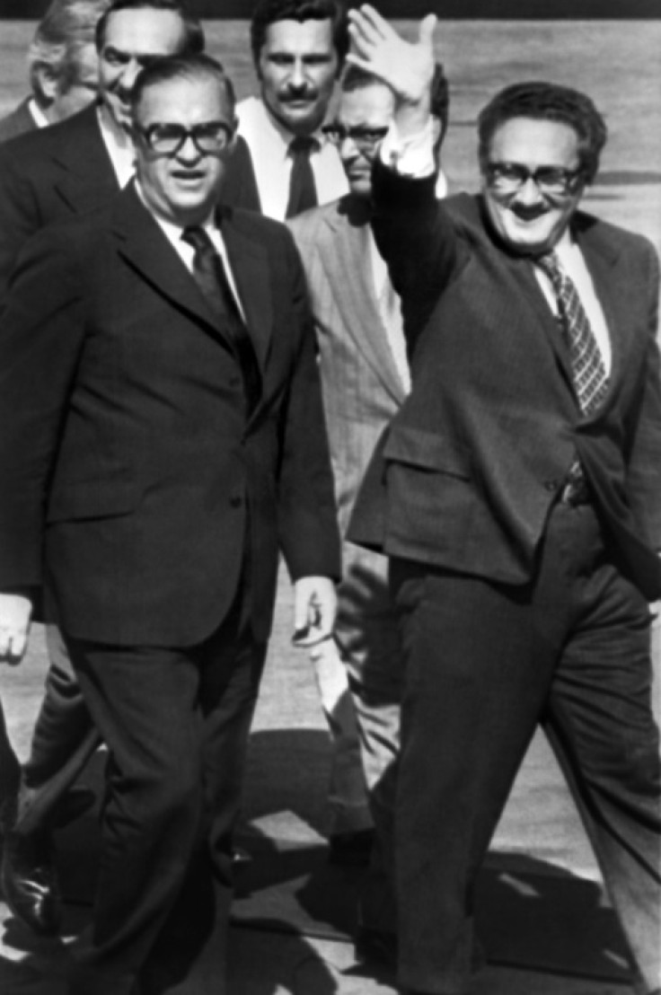 US Secretary of State Henry Kissinger (right) walks next to Israel's foreign minister, Abba Eban, at the Tel Aviv airport in 1973