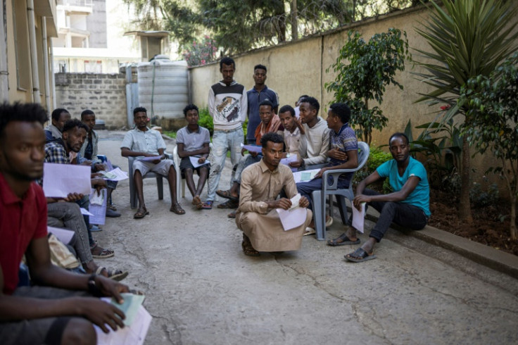 Ethiopian returnees, who are processed at an IOM transit centre in Addis Ababa, now face an uncertain future back homegather in the courtyard of the International Organization for Migration (IOM) transit centre in Addis Ababa