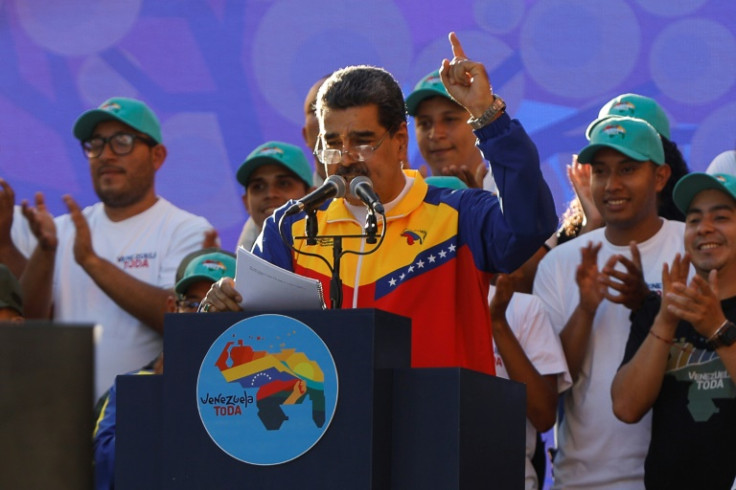 Venezuelan President Nicolas Maduro speaks at a December 1, 2023, rally in Caracas ahead of a referendum he hopes will bolster Venezuela's claim to the vast, oil-rich Essequibo territory controlled by neighboring Guyana