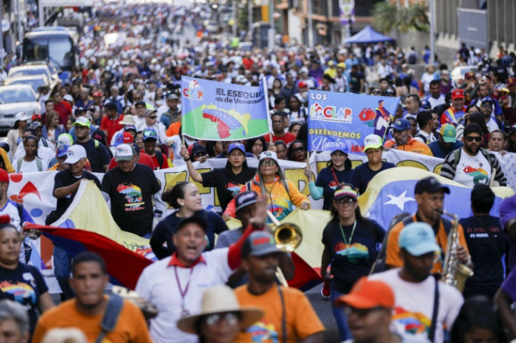 Venezuelans march in Caracas on December 1, 2023, to support a referendum asserting a claim over the vast Essequibo territory controlled by Guyana