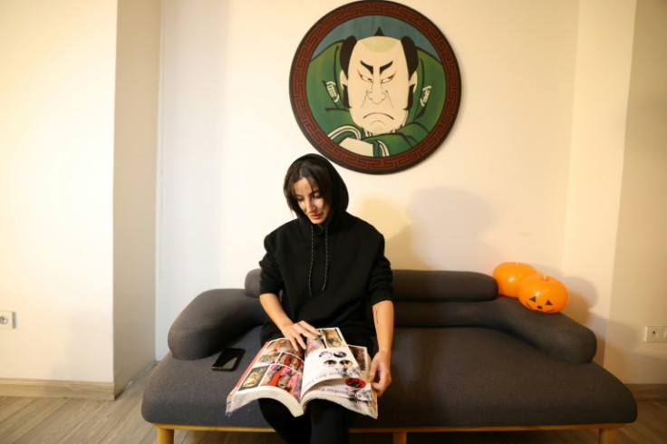 In Tehran, numerous tattoo studios showcased designs featuring the slogan 'Woman, life, freedom' -- a rallying cry during nationwide protests sparked by the death in custody last year of Mahsa Amini