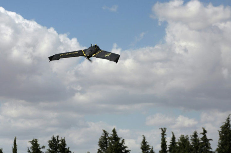 A drone from the RoboCare startup company flies over an agricultural area to scan the trees and assess their overall health in the region of Nabeul, Tunisia