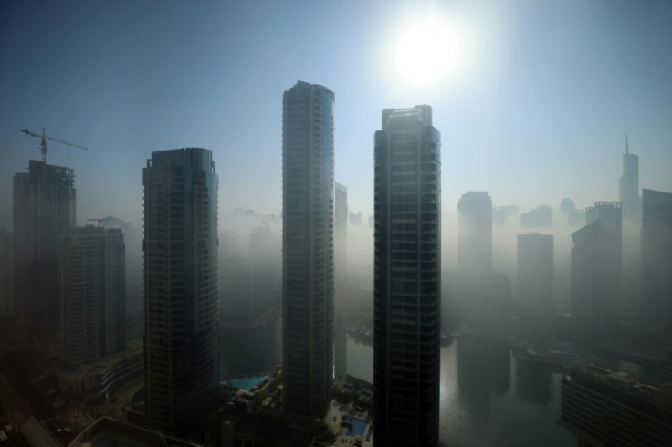 Skyscrapers amidst fog near Dubai Marina last year